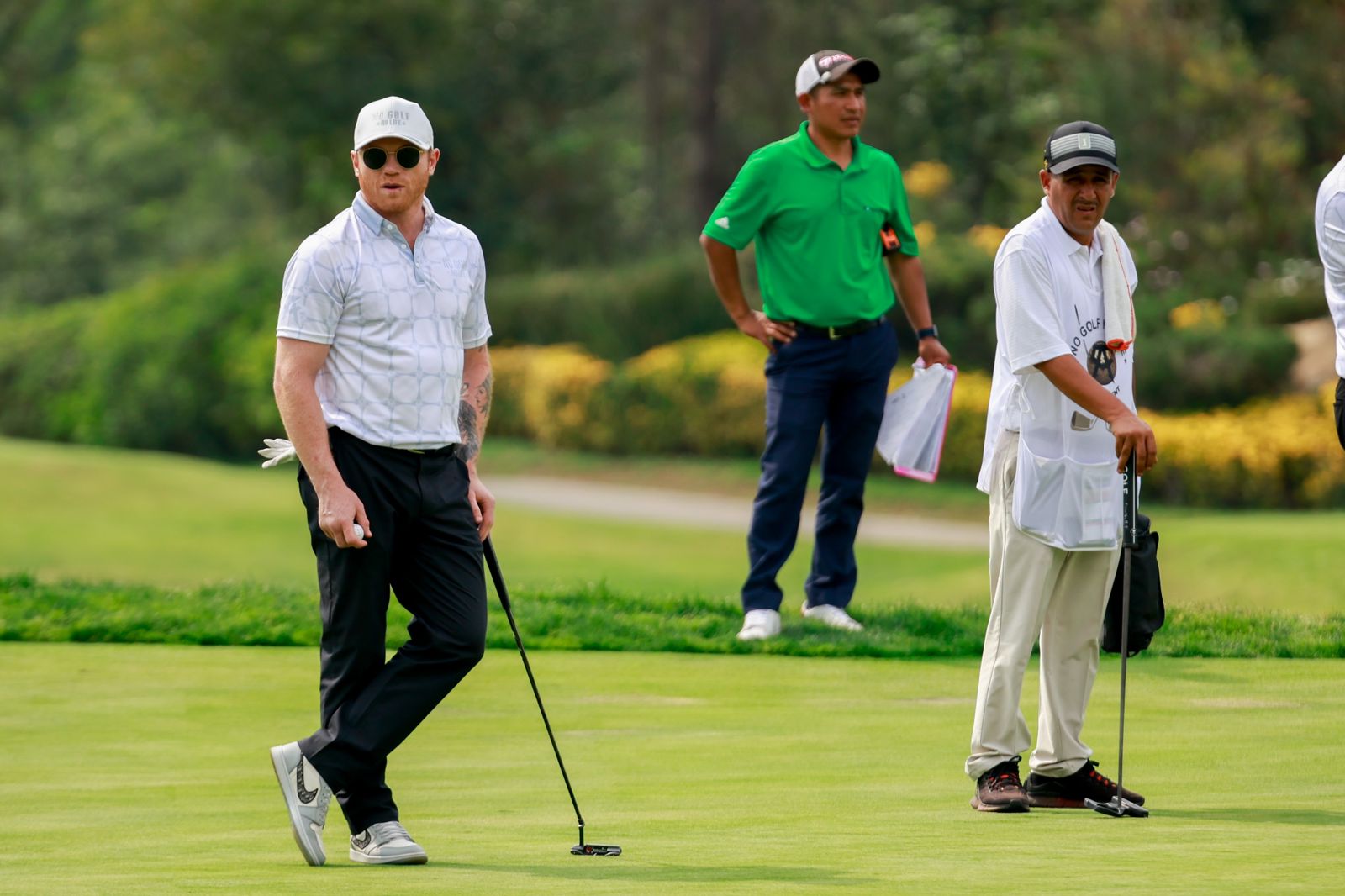 Golfistas durante una dinámica de torneo